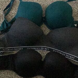 Three Victoria’s Secret bras. Green and Sport bra ARE 36DD. Black strapless 34DD